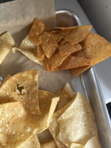 Given burnt chips after complaining that I was shorted on the meat portion if my burrito.