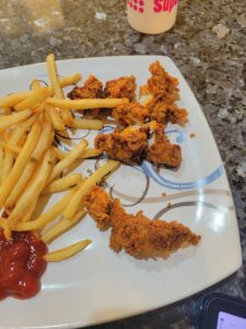 Old burnt pieces of chicken